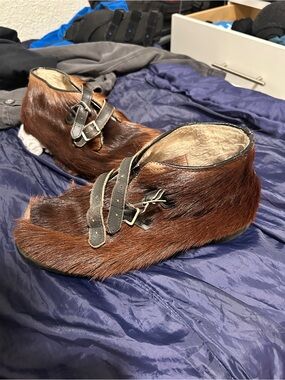 Women’s Brown Fur Moccasin Slippers with Buckle Straps. Canadian history